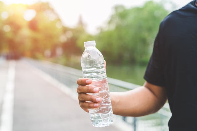 Image of a man holding a water bottle August 06, 2024. (Getty)