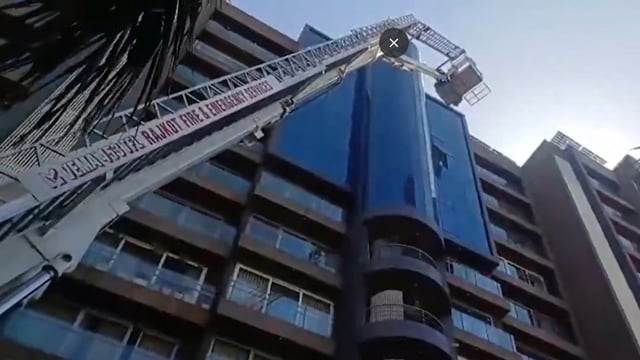 The fire erupted on the sixth floor of the multi-story residential complex in Rajkot.