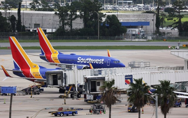 Southwest Airlines - which recently announced it was ending its bags-fly-free policy - carries more than 20% of the passengers in and out of Orlando International Airport.(Ricardo Ramirez Buxeda/ Orlando Sentinel)zn952wn