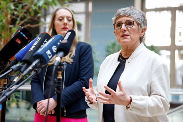 Britta Hasselmann and Katharina Droege, co-chairs of the Greens parliamentary group, address the media after the Greens agreed on a massive increase in state borrowing just days ahead of a parliamentary vote next week, in Berlin, Germany, March 14, 2025. REUTERS/Axel Schmidt
