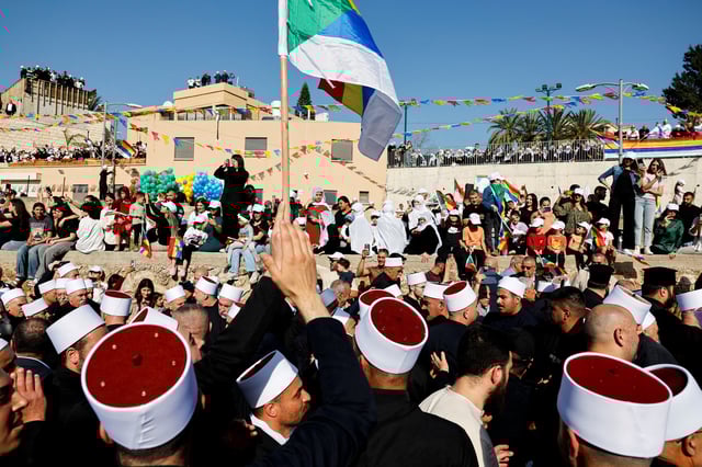 People gather on the day Israeli Druze leader Sheik Mowafaq Tarif and around 100 Syrian Druze religious elders, in the first Druze delegation from Syria just after 1973 war, visit the Nabi Shuayb Shrine, a holy place for the Druze community, in northern Israel March 14, 2025. REUTERS/Ammar Awad
