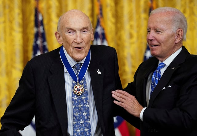 U.S. President Joe Biden awards the Presidential Medal of Freedom to former U.S. Sen. Alan Simpson (R-WY) during a ceremony in the East Room at the White House in Washington, U.S., July 7, 2022.