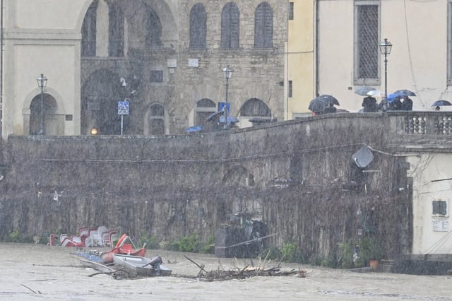 A view of the Arno River during heavy rainfall in Florence, Italy (Photo: Carlo Bressan/Anadolu via Getty Images)