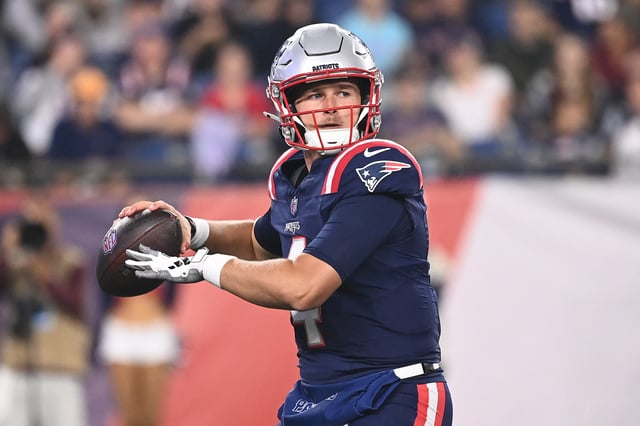 Aug 15, 2024; Foxborough, MA, USA; New England Patriots quarterback Bailey Zappe (4) looks to pass during the second half against the Philadelphia Eagles at Gillette Stadium. Mandatory Credit: Eric Canha-USA TODAY Sports/File Photo
