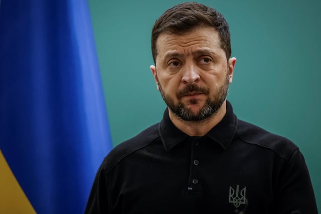 Ukraine’s President Volodymyr Zelenskiy speaks to Ukrainian Muslim service members before sharing an iftar with them, a meal to break their fast at sunset, during the holy month of Ramadan, in a mosque in Kyiv, Ukraine March 13, 2025. REUTERS/Alina Smutko/File Photo