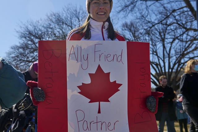 Natalie Wright, 33, of Ottawa, ON, Canada, joins a protest against the Trump administration's policies at Capitol building in Washington D.C. on Presidents' Day, Feb. 17, 2025. 