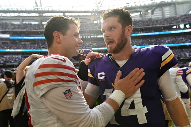 Brock Purdy of the San Francisco 49ers and Sam Darnold of the Minnesota Vikings speak following the game at U.S. Bank Stadium on September 15, 2024 in Minneapolis, Minnesota.