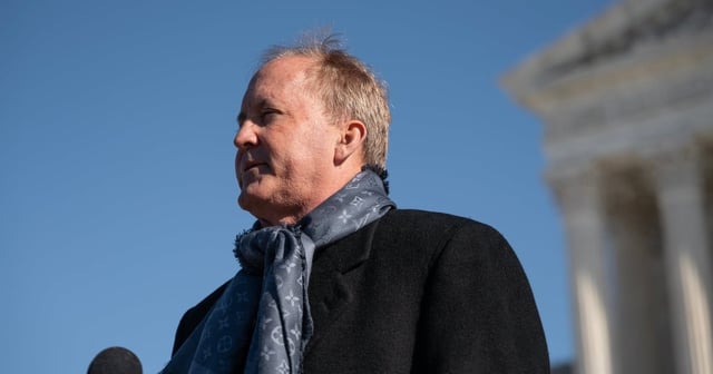Texas Attorney General Ken Paxton speaks to the media during a press conference in front of the Supreme Court in Washington on Jan. 15, 2025.