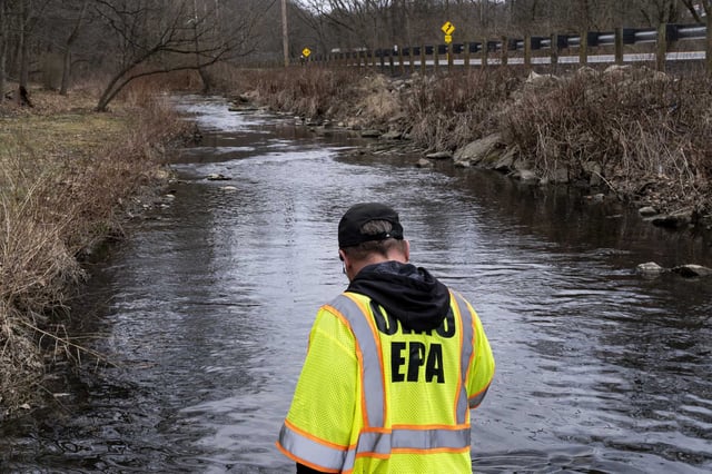 The U.S. Environmental Protection Agency was formed in the 1970s to &#34;protect human health and to safeguard the natural environment.&#34; In this file photo, EPA staff respond to a 2023 train carrying toxic chemicals from Houston that derailed in East Palestine, Ohio.