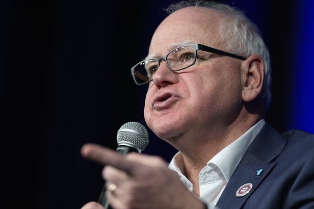 Minnesota Gov. Tim Walz speaks at a town hall event at Roosevelt High School, Friday, March 14, 2025, in Des Moines, Iowa. (AP Photo/Matthew Putney)