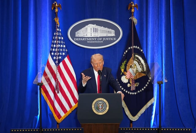 US President Donald Trump speaks at the Justice Department in Washington, DC, on Friday.