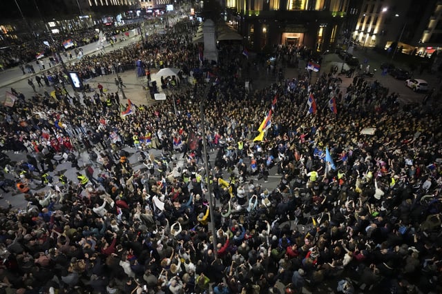 Protesters gather ahead of a major rally this weekend in downtown Belgrade, Serbia, Friday, March 14, 2025. (AP Photo/Darko Vojinovic)