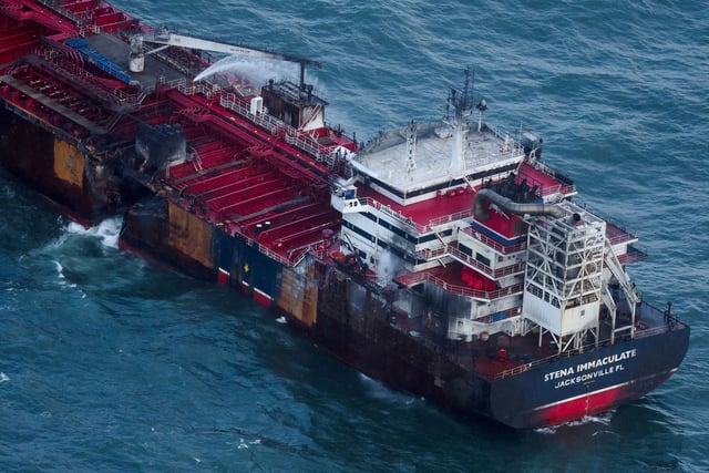 Water flows through a damaged hull of Stena Immaculate oil tanker ship after it collided with a cargo ship off the northeastern coast of England, Britain, March 11, 2025. REUTERS/Phil Noble/File Photo