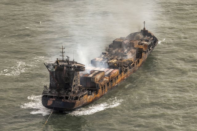 Smoke rises from the Solong cargo ship in the North Sea on Tuesday.