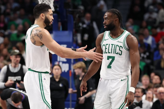 DALLAS, TEXAS - JANUARY 25: Jayson Tatum #0 and Jaylen Brown #7 of the Boston Celtics talk on the court during the second half against the Dallas Mavericks at American Airlines Center on January 25, 2025 in Dallas, Texas.