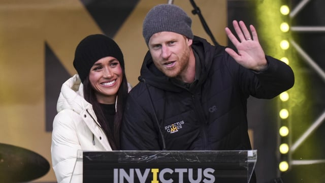 Prince Harry and his wife Meghan, the Duke and Duchess of Sussex, attend a welcome celebration during the 2025 Invictus Games, in Whistler, British Columbia, Monday, Feb. 10, 2025. (Darryl Dyck/The Canadian Press via AP)