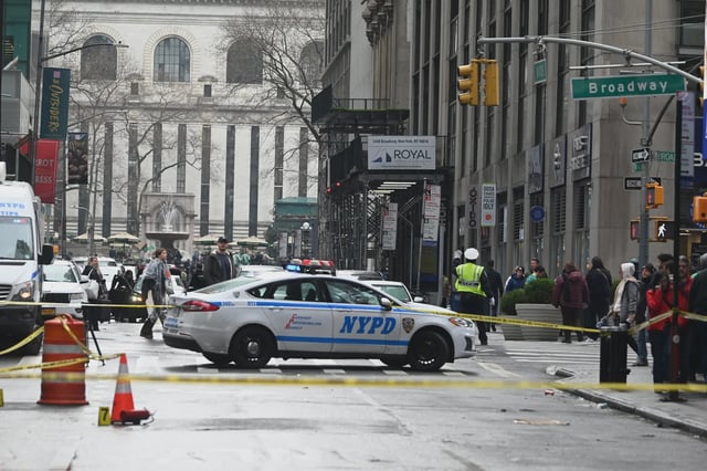 Police were looking for a suspect on Sunday after a man was set on fire in Times Saquare.