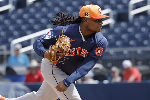 Feb 26, 2025; West Palm Beach, Florida, USA; Houston Astros pitcher Framber Valdez (59) throws a warmup pitch before the first inning against the Washington Nationals at CACTI Park of the Palm Beaches. Reinhold Matay-Imagn Images/File Photo