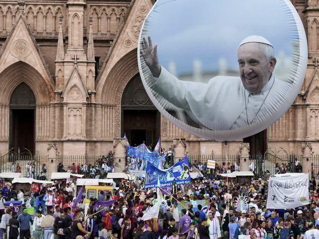 A drone view shows a balloon with the image of Pope Francis and the Lujan basilica during a Mass for the recovery of Pope Francis' health, in Buenos Aires, Argentina, March 16, 2025. REUTERS/Martin Cossarini
