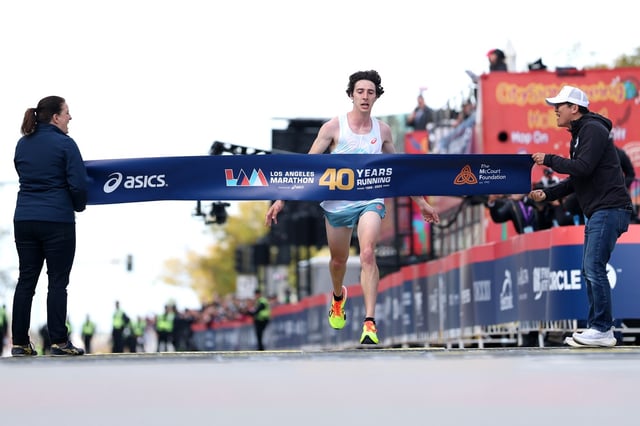 Matt Richtman of the United States crosses the finish line and wins the 2025 Los Angeles Marathon at Westfield Century City on March 16, 2025, in Los Angeles, California. (Luke Hales/Getty)