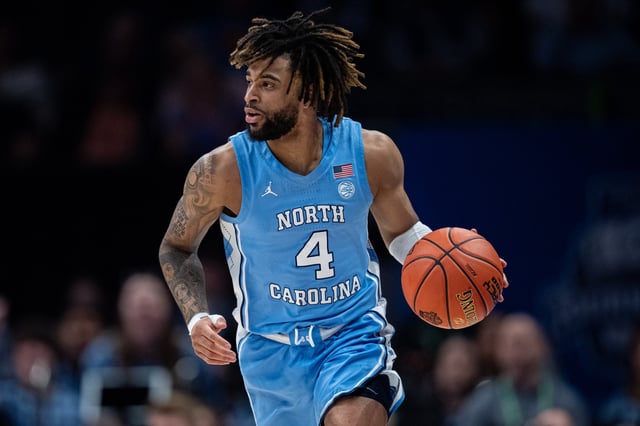 RJ Davis #4 of the North Carolina Tar Heels brings the ball up court in the first half against the Duke Blue Devils during the semifinal round of the ACC men&#39;s basketball tournament. North Carolina made the NCAA Tournament.