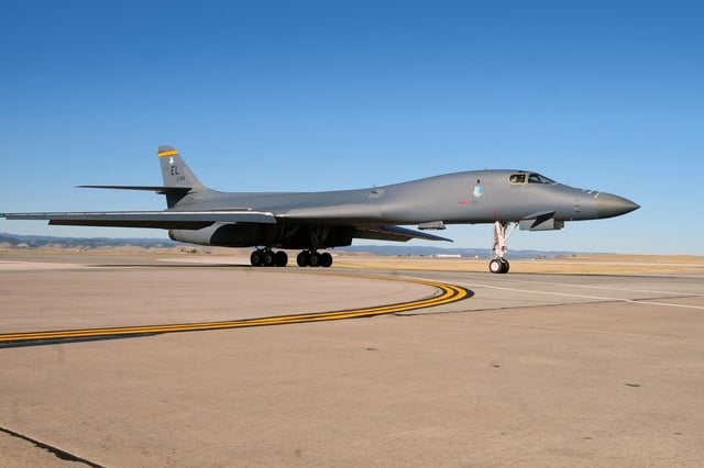 A B-1B Lancer taxis on the flightline at Ellsworth Air Force Base.
