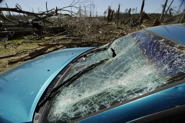Steve Romero's vehicle's windshield displays the damage from Saturday's tornado, in Tylertown, Miss., on Sunday, March 16, 2024. (AP Photo/Rogelio V. Solis)