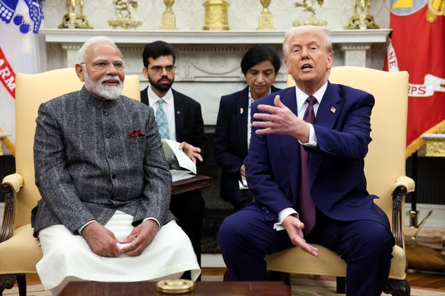 U.S. President Donald Trump meets with Indian Prime Minister Narendra Modi at the White House in Washington, D.C., U.S., February 13, 2025. REUTERS/Kevin Lamarque/File Photo