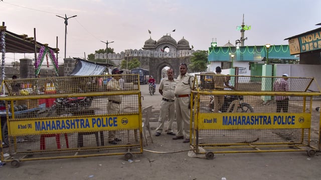 Security outside the Mughal emperor Aurangzeb's tomb, in Chhatrapati Sambhajinagar, Maharashtra, Sunday, March 16.