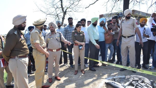 Amritsar police commissioner Gurpreet Singh Bhullar (second from left) with other officials at the encounter site at Rajasansi in Amritsar on Monday. (Sameer Sehgal/HT)