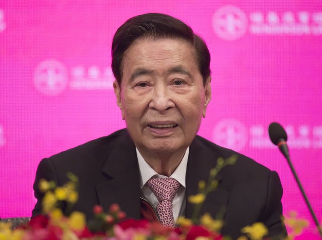 FILE - Henderson Land Development's founder and chairman Lee Shau Kee attends a news conference as he announces his retirement after the company's general meeting in Hong Kong, Tuesday, May 28, 2019. (AP Photo/Kin Cheung, file)