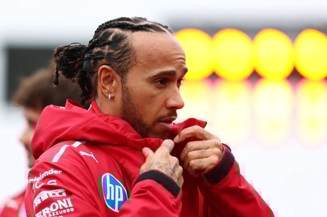 Lewis Hamilton of Great Britain and Scuderia Ferrari on the drivers parade prior to the F1 Grand Prix of Australia at Albert Park Grand Prix Circuit on March 16, 2025 in Melbourne, Australia.