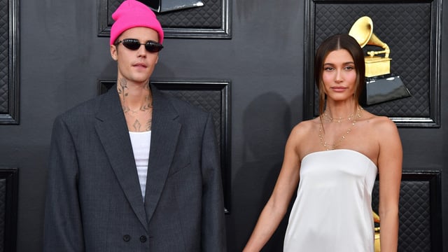 (FILES) Hailey Bieber supports Justin Bieber during tough times, taking him to Disneyland for a fun day together.
(Photo by ANGELA WEISS / AFP)