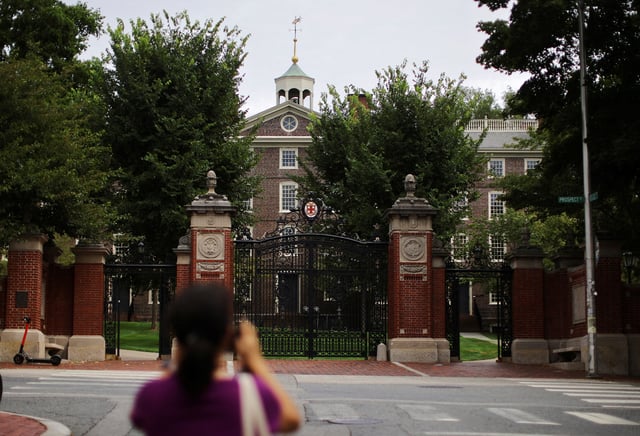 The Van Wickle Gates stand at the edge of the main campus of Brown University in Providence, Rhode Island, U.S., August 16, 2022.     REUTERS/Brian Snyder/File Photo