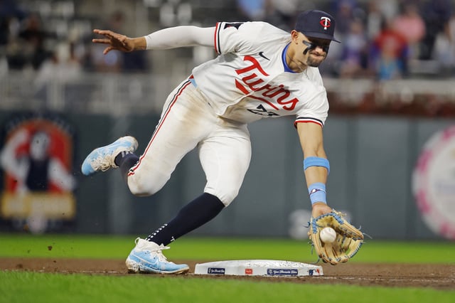 Sep 24, 2024; Minneapolis, Minnesota, USA; Minnesota Twins third baseman Royce Lewis (23) fields a ball hit by Miami Marlins third baseman Connor Norby (not pictured) in the ninth inning at Target Field. Mandatory Credit: Bruce Kluckhohn-Imagn Images/File Photo