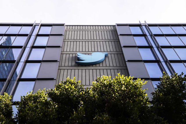 The Twitter logo is seen at Twitter headquarters in San Francisco, in 2022. One of the two original 12-foot bird logos that once adorned the building is now up for sale, offering an opportunity to own a piece of social media history. 