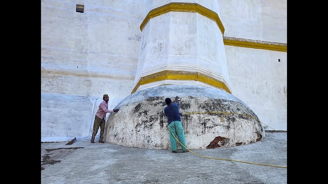 Workers whitewash the outer wall of the Shahi Jama Masjid, in Sambhal district on Monday. (PTI)
