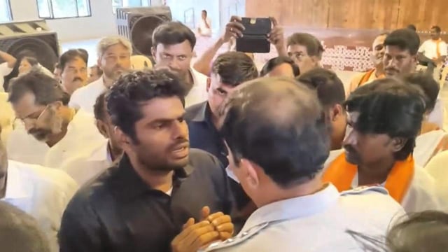 Tamil Nadu BJP chief K Annamalai argues with the police while being released on Monday. (PTI)