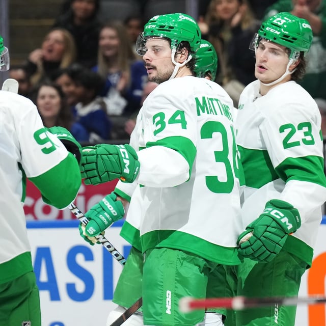 Toronto Maple Leafs forward Auston Matthews (34) celebrates his goal against the Calgary Flames with forward John Tavares (91), and forward Matthew Knies (23) during second period NHL hockey action in Toronto on Monday, March 17, 2025. THE CANADIAN PRESS/Nathan Denette