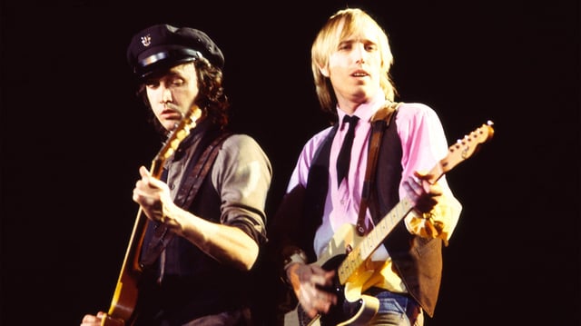 Mike Campbell and Tom Petty of the group Tom Petty and the Heartbreakers, perform at Nassau Coliseum, Uniondale, New York, March 31, 1983.