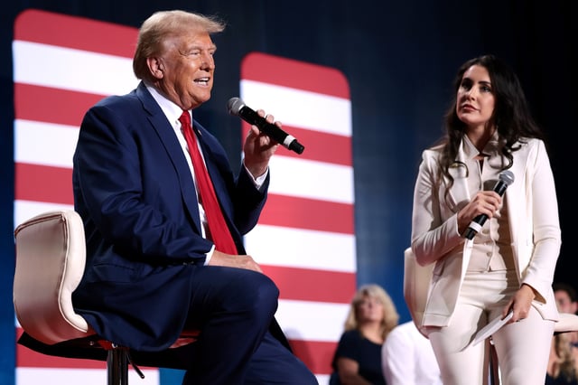 President Donald Trump (L) participates in a town hall moderated by Rep. Anna Paulina Luna (R-FL) at the Crown Center Arena October 4, 2024 in Fayetteville, North Carolina.