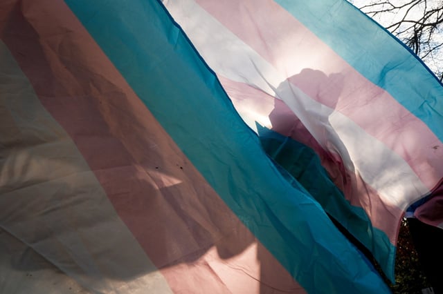 A protester during a pro-transgender rights protest outside of Seattle Children's Hospital in Seattle on Feb. 9, 2025.