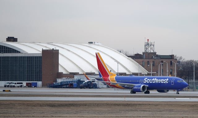 A Southwest Airlines Co. Boeing 737 MAX 8 aircraft sits at Midway International Airport in Chicago, Illinois, U.S., March 13, 2019. REUTERS/Kamil Kraczynski/File Photo