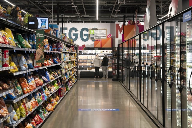 Shoppers can be seen at an Amazon Fresh grocery store on December 12, 2024, in Federal Way, Washington. (Photo by David Ryder/Getty Images)