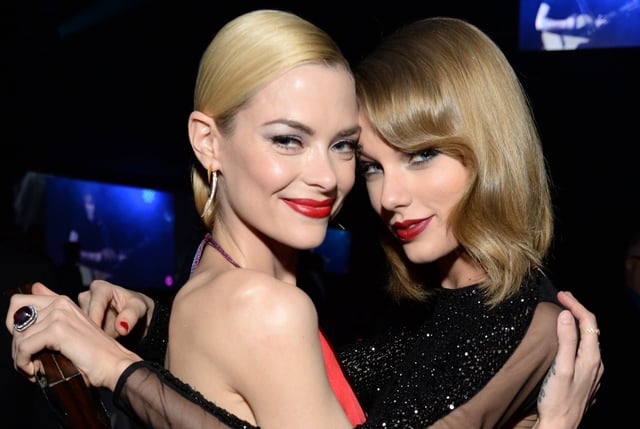 Actress Jaime King (L) and recording artist Taylor Swift attend the 22nd Annual Elton John AIDS Foundation Academy Awards Viewing Party at The City of West Hollywood Park on March 2, 2014 in West Hollywood, California.