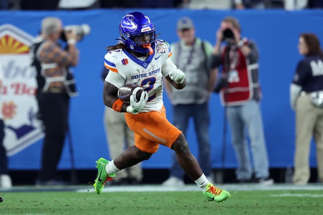 Running back Ashton Jeanty #2 of the Boise State Broncos runs during the Vrbo Fiesta Bowl against the Penn State Nittany Lions at State Farm Stadium on December 31, 2024.