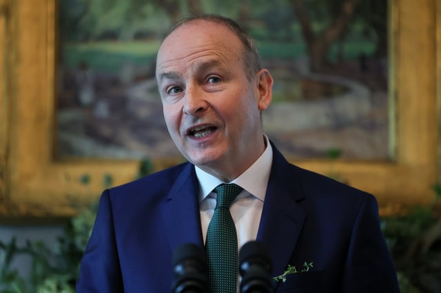 Irish Taoiseach (Prime Minister) Micheal Martin delivers remarks during his visit at U.S. Vice President JD Vance's residence for breakfast, ahead of St. Patrick's Day, in Washington, D.C., U.S., March 12, 2025. REUTERS/Leah Millis/File Photo