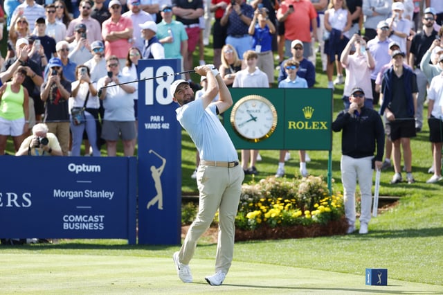 Mar 14, 2025; Ponte Vedra Beach, Florida, USA; Scottie Scheffler hits off of the eighteenth tee during the second round of The Players Championship golf tournament at TPC Sawgrass. Mandatory Credit: Jeff Swinger-Imagn Images/File Photo