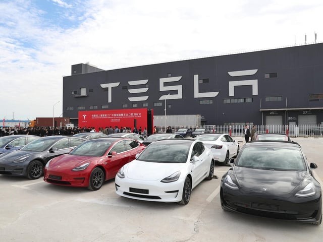 Tesla electric vehicles outside the company's Shanghai gigafactory.