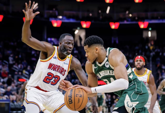 Draymond Green defends against Giannis Antetokounmpo in the second half as the Golden State Warriors play the Milwaukee Bucks at Chase Center in San Francisco on March 18, 2025.
